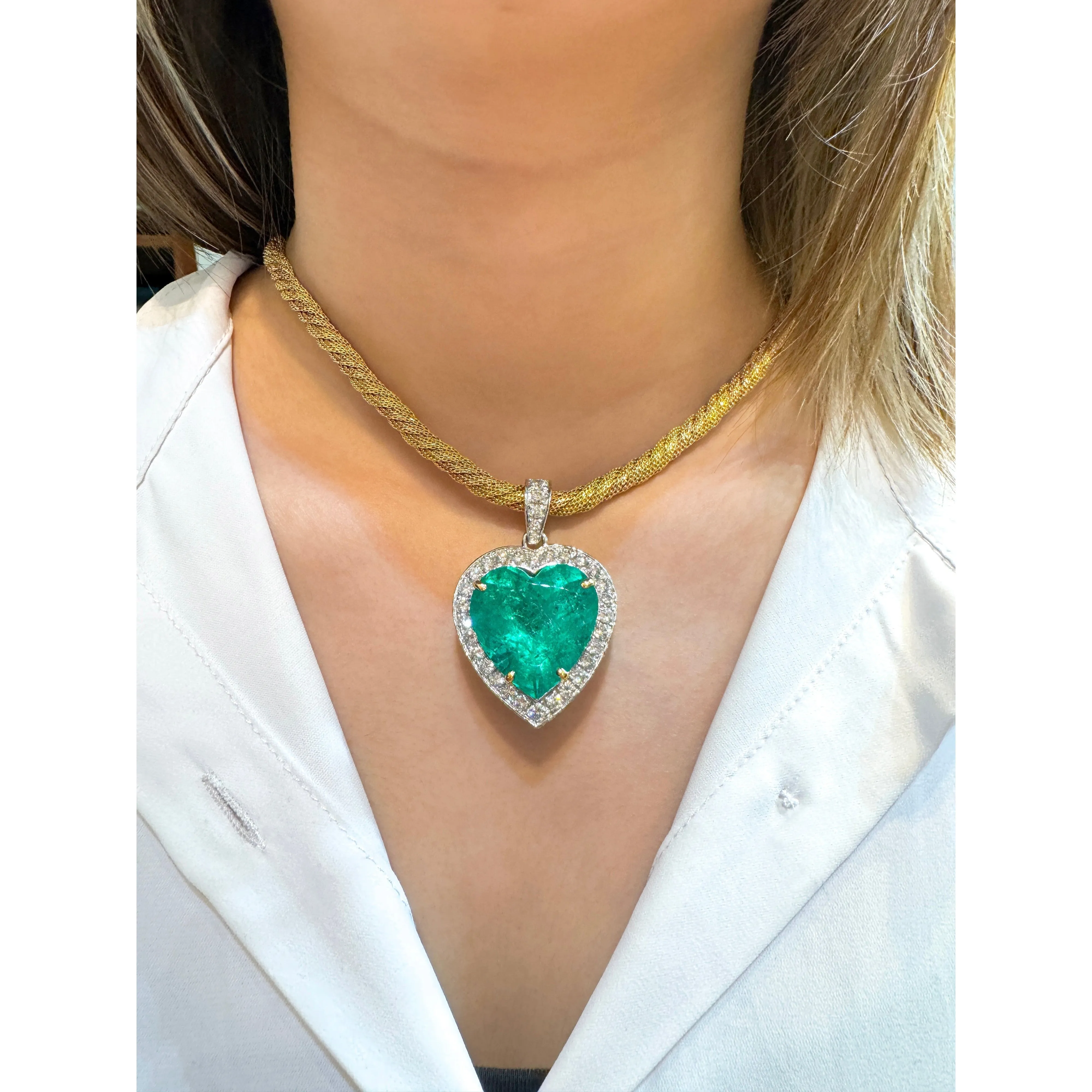 44 Carat Heart Shaped Emerald Pendant with Round Cut Diamond Halo in 18K Gold Necklace