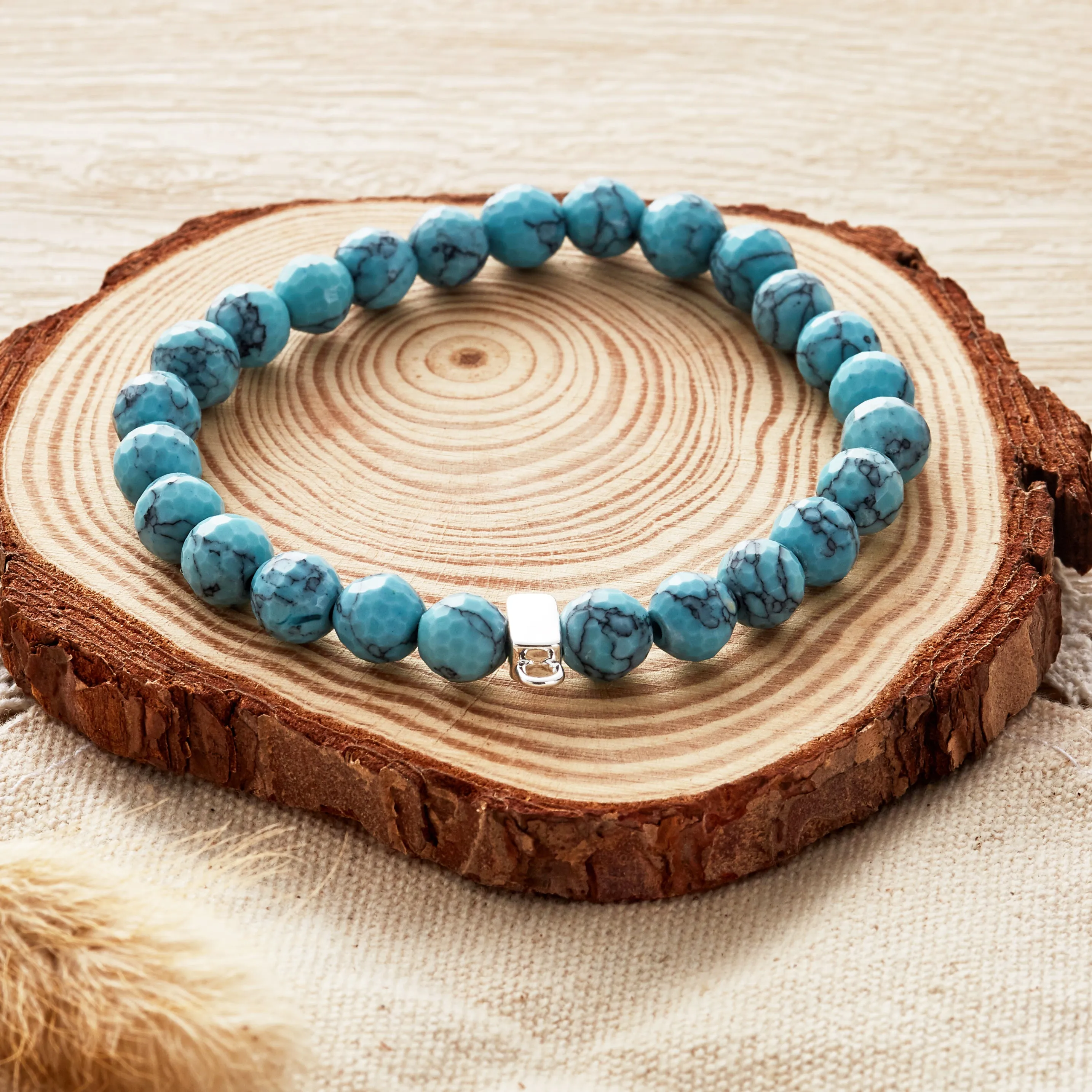 Faceted Synthetic Turquoise Gemstone Stretch Bracelet with Charm Created with Zircondia® Crystals