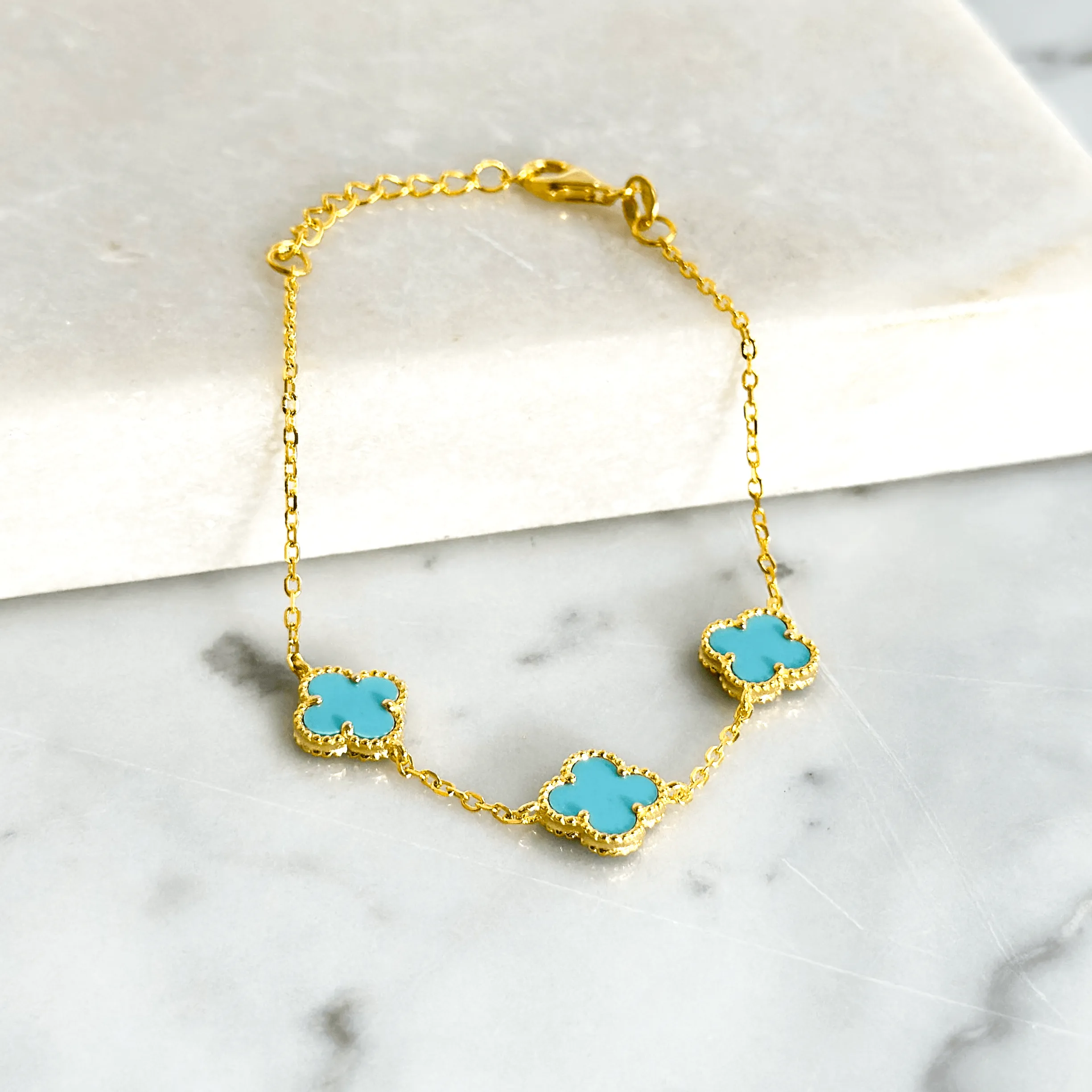 Gold Bracelet with 3 Turquoise Clover shapes