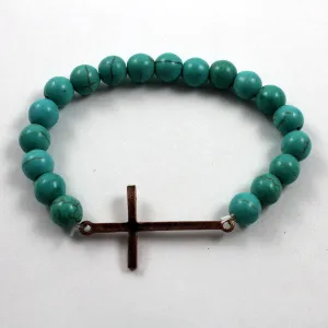 Turquoise beaded bracelet with Copper toned Sleek Cross Charm